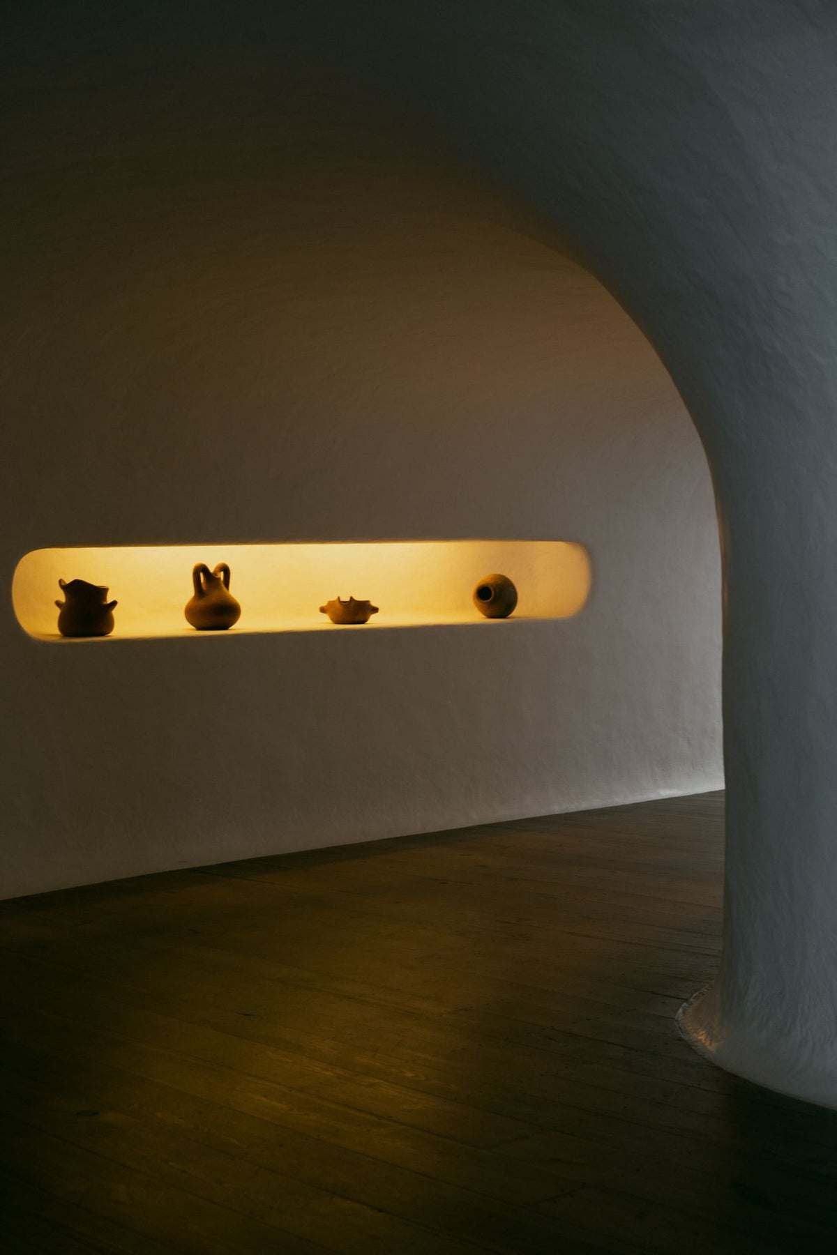 Pottery on a shelf in a calm minimalist interior